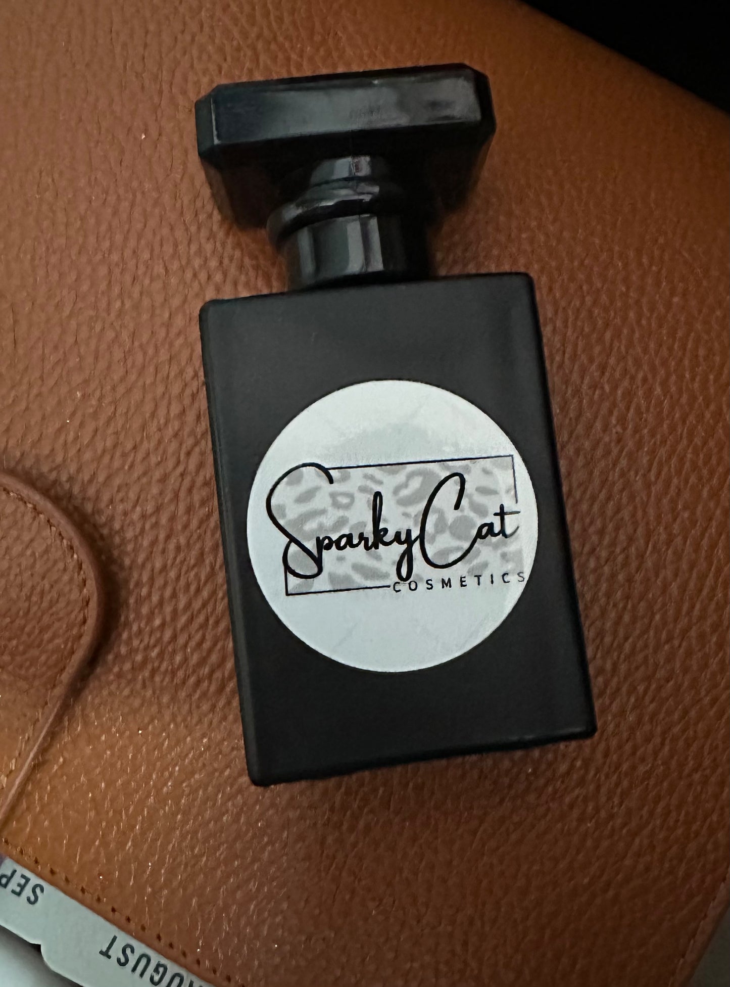 SparkyCat Black Cologne